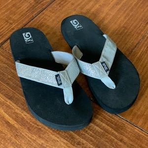 Teva silver sparkle flip flops, size 7